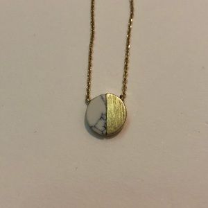 marble and gold color necklace